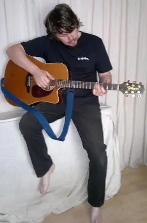 Go Tell Alice Steve playing guitar